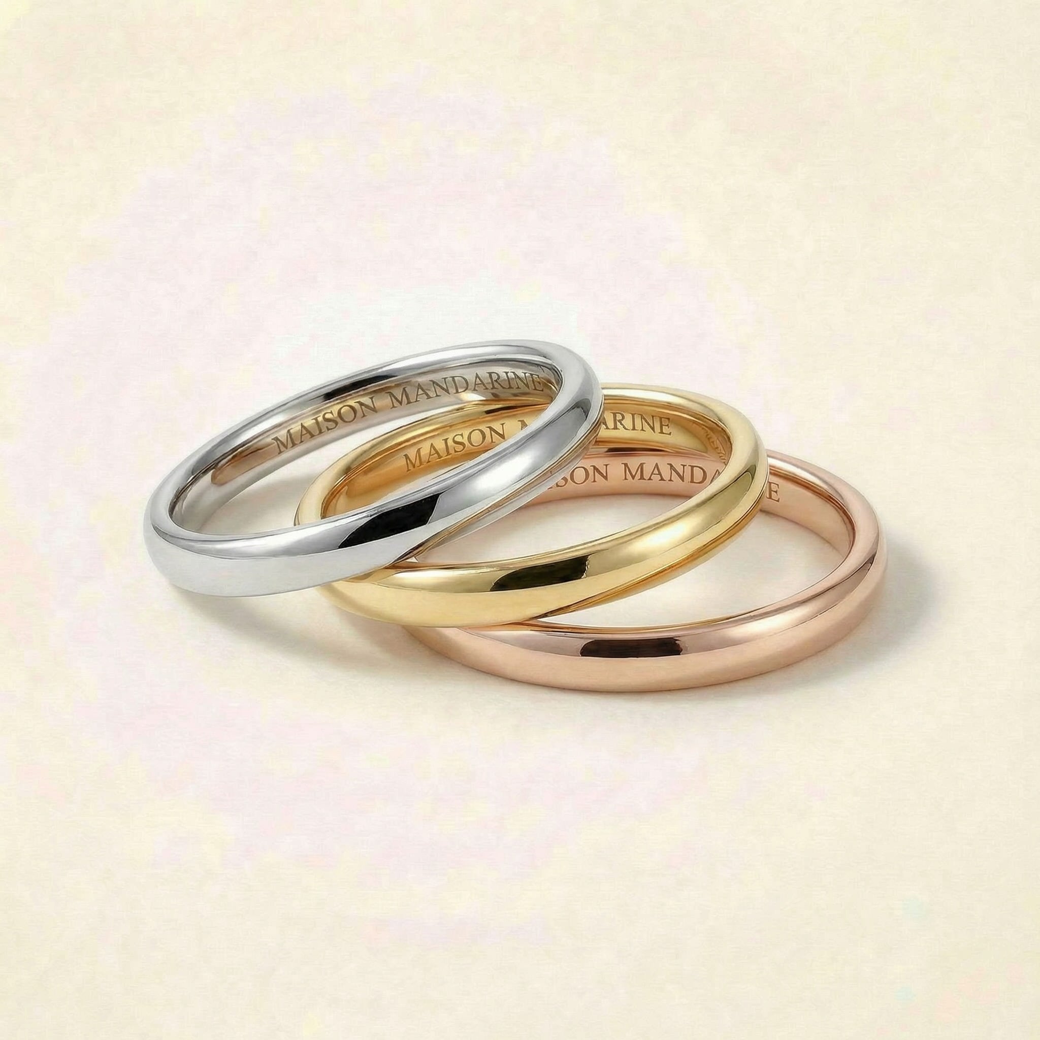 Alliances demi-jonc finition brillante en or jaune, or blanc et or rose 18 carats recyclé Maison Mandarine.
